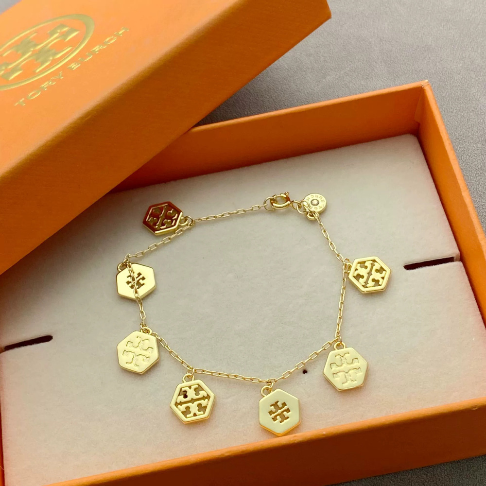 Tory Burch Gold Plated Copper Multi Pendant Bracelet